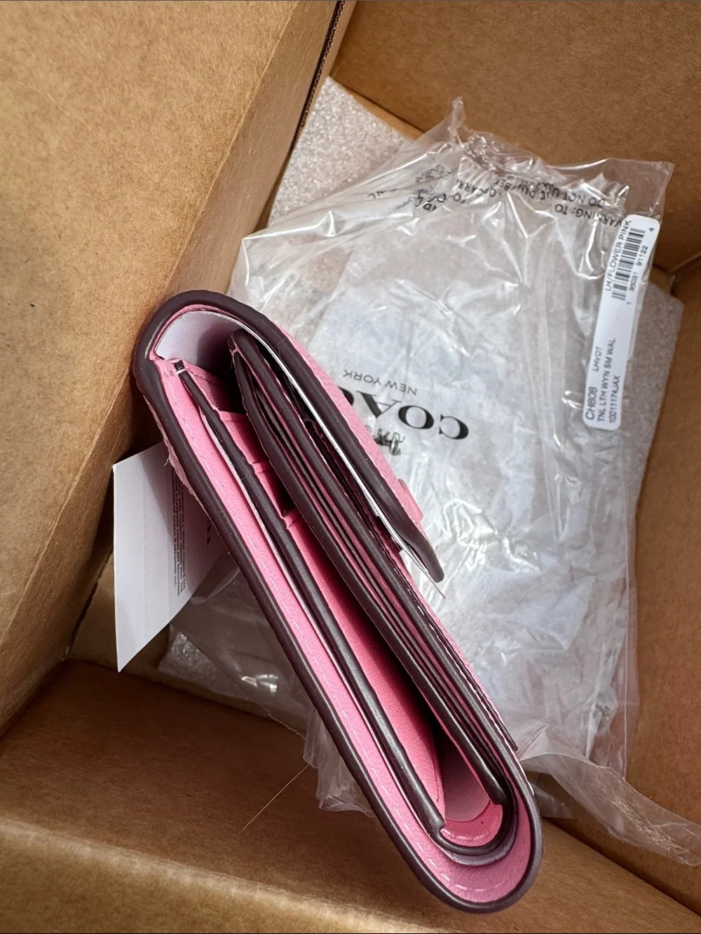 COACH Pink Pebbled Leather wyn small Wallet